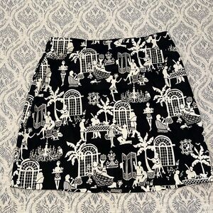 Lilly Pulitzer black and white print skirt with back zipper and front pockets.